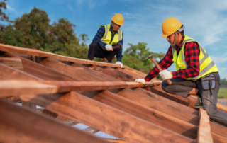 professionals building a roof